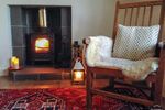 Old traditional Shetland chair by the stove