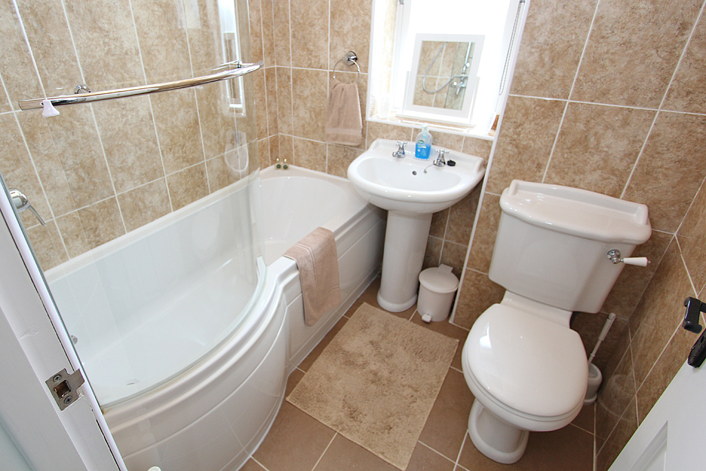 Bathroom with over-bath shower